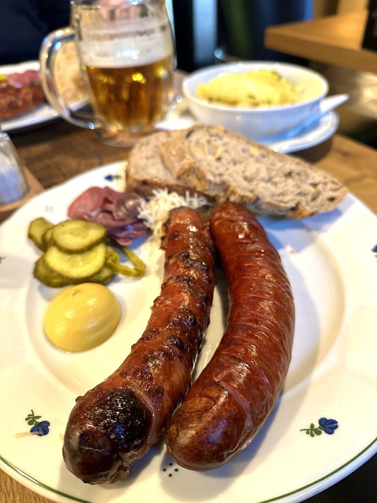 A hearty meal of garlicky grilled sausages, potato salad, and outstanding Czech pilsner is a mainstay of dining in Karlovy Vary