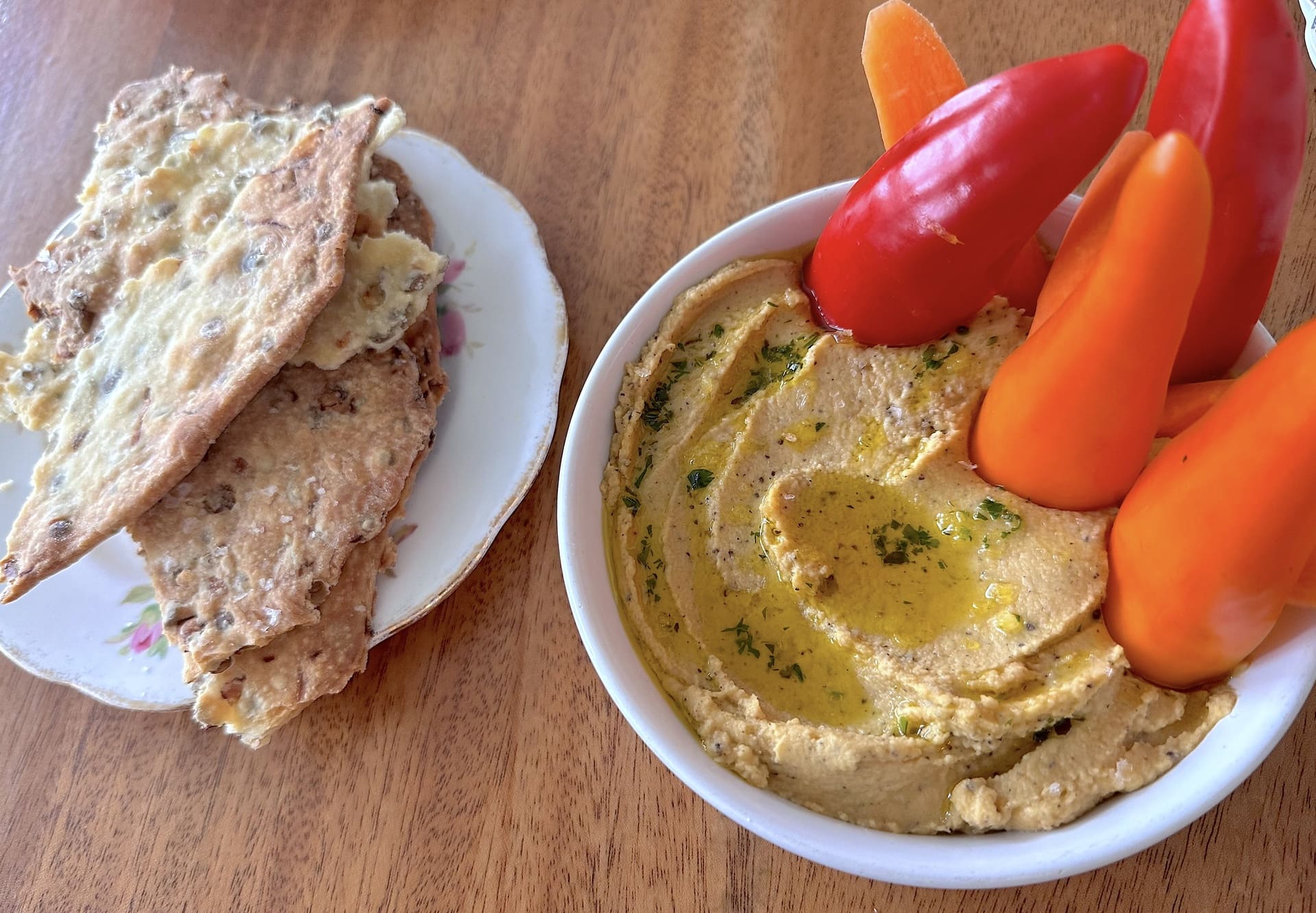 At the Deane House, red lentil hummus is served with Red Fife crackers, showcasing the local bounty in Southern Alberta