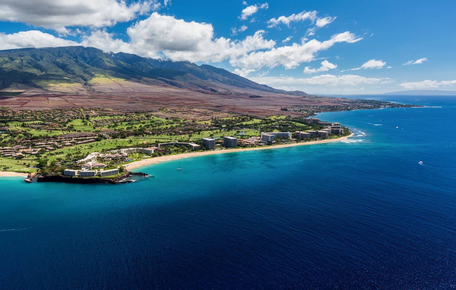Hotels line the golden-sand stretch of Ka‘anapali Beach, Maui