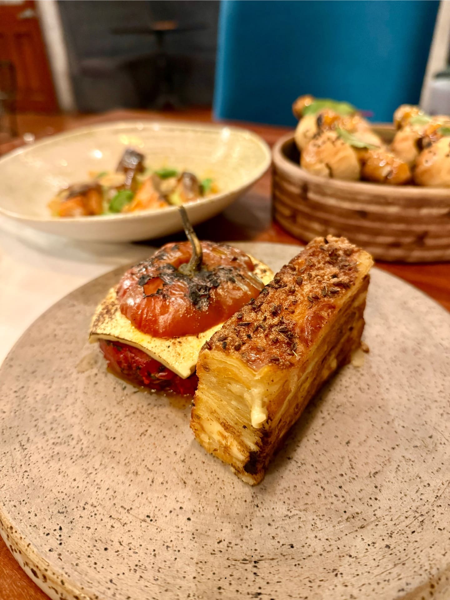 Stuffedpepperandpatats-Barnard Arequipa is famous for baked stuffed spicy red rocoto pepper with multilayered, cheesy pastel de papas