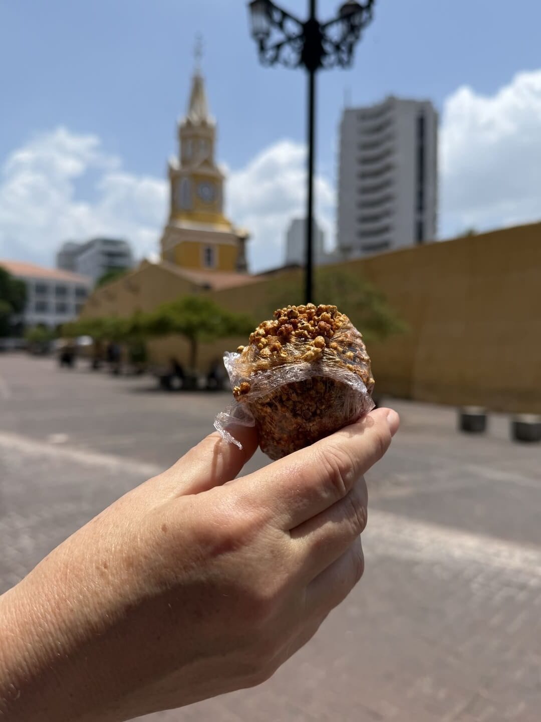 A popped millet happiness ball is a popular sweet sold in Cartagena, Colombia