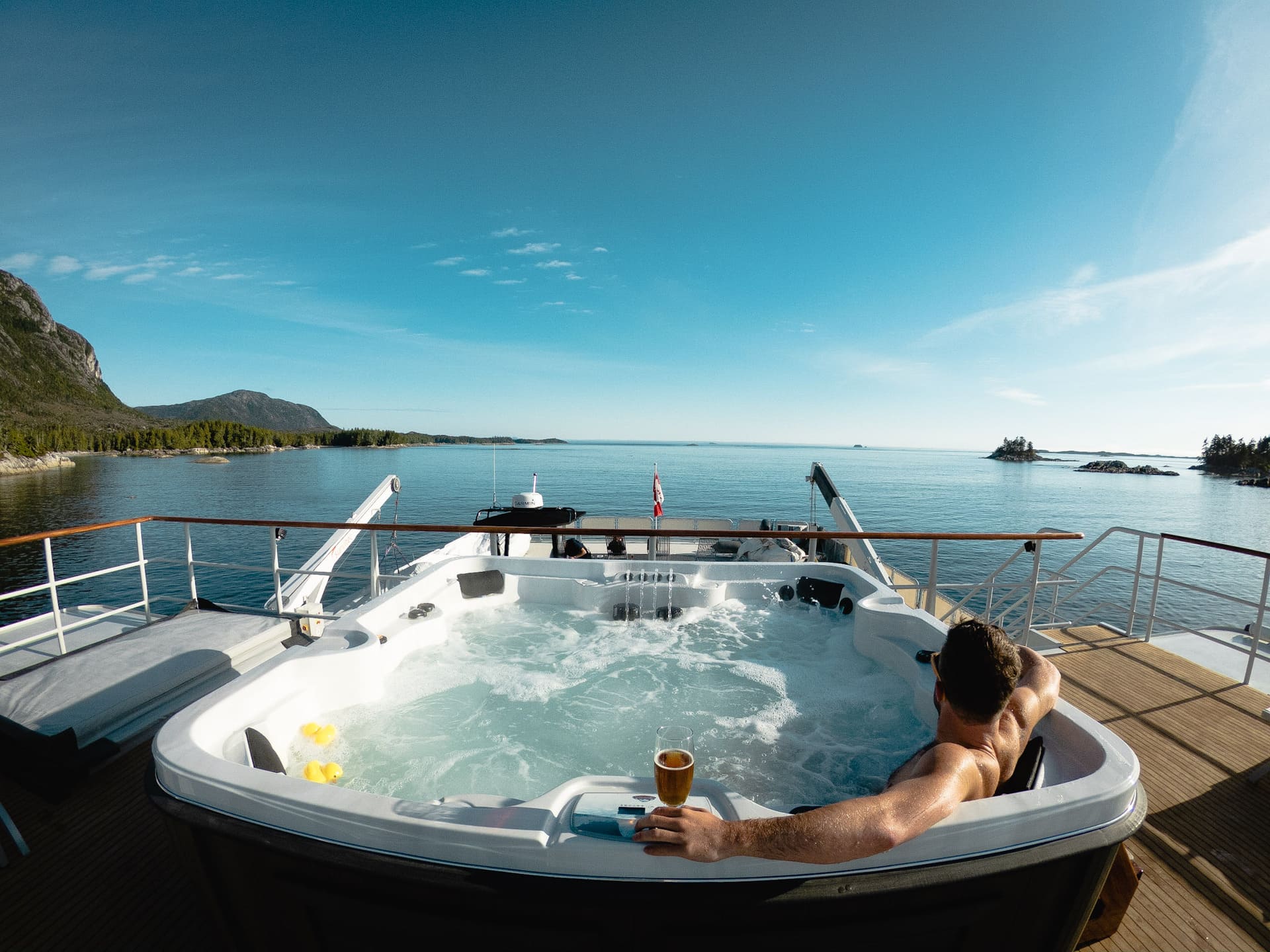 Relaxing in the top deck hot tub on Cascadia