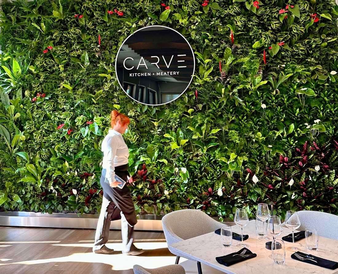 Living wall in the dining room of Crave Kitchen & Meatery