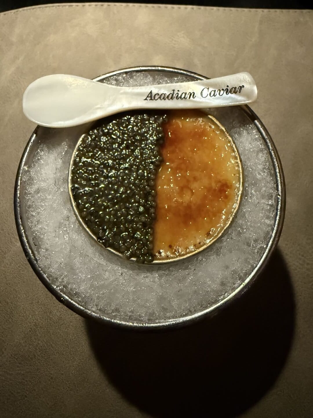 Crème brûlée pré-dessert made with candy cap mushrooms and topped with Acadian Caviar at Tanière³