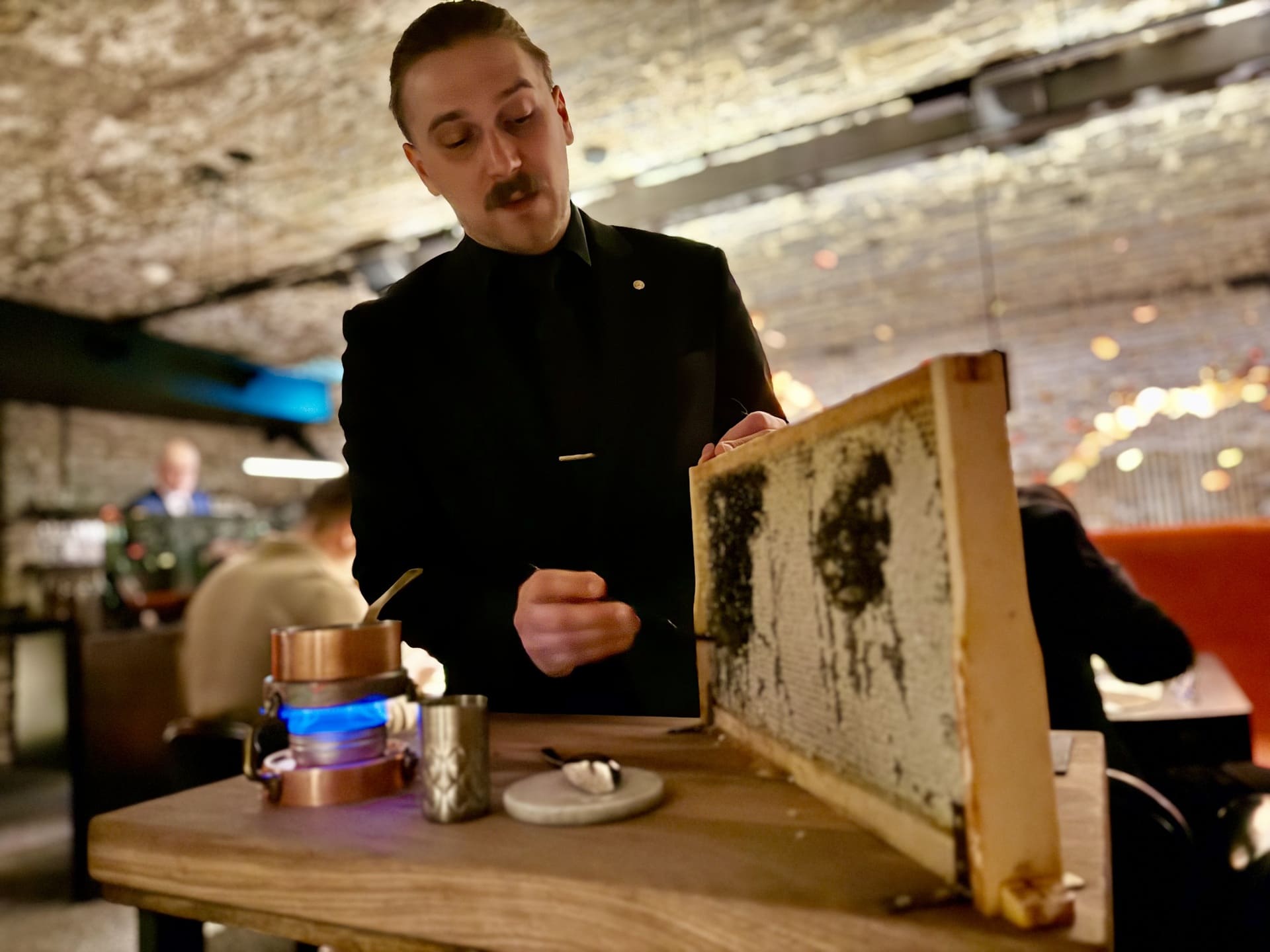 honeyjus-taniere3-barnard Honey from the comb is used to prepare a sauce tableside at Tanière³.